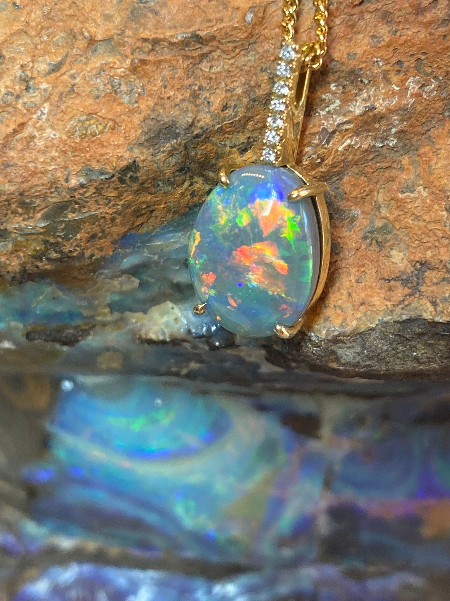 Classic Lightning Ridge Solid Opal 18ct Claw setting