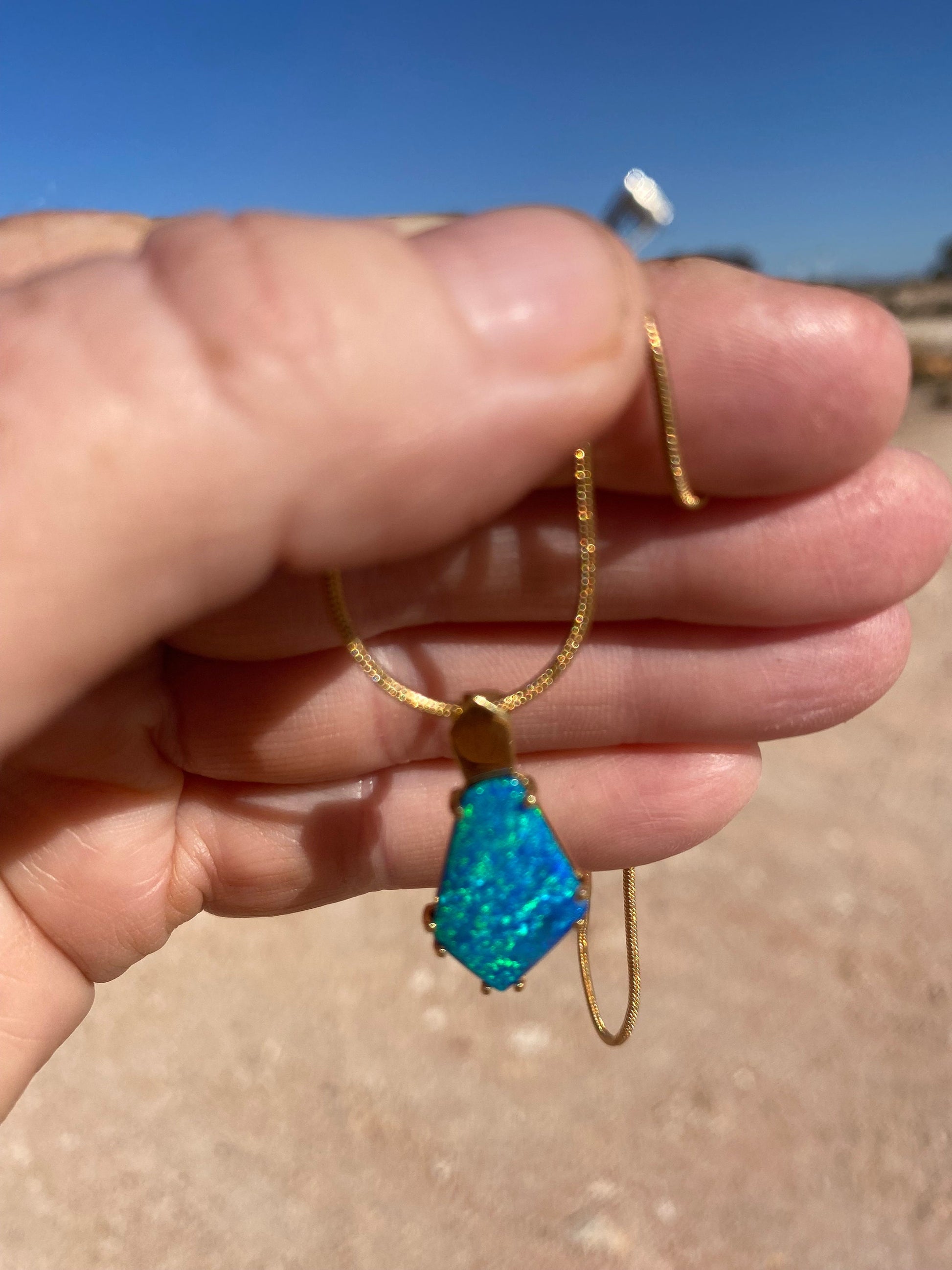 Gold Opal Pendant.