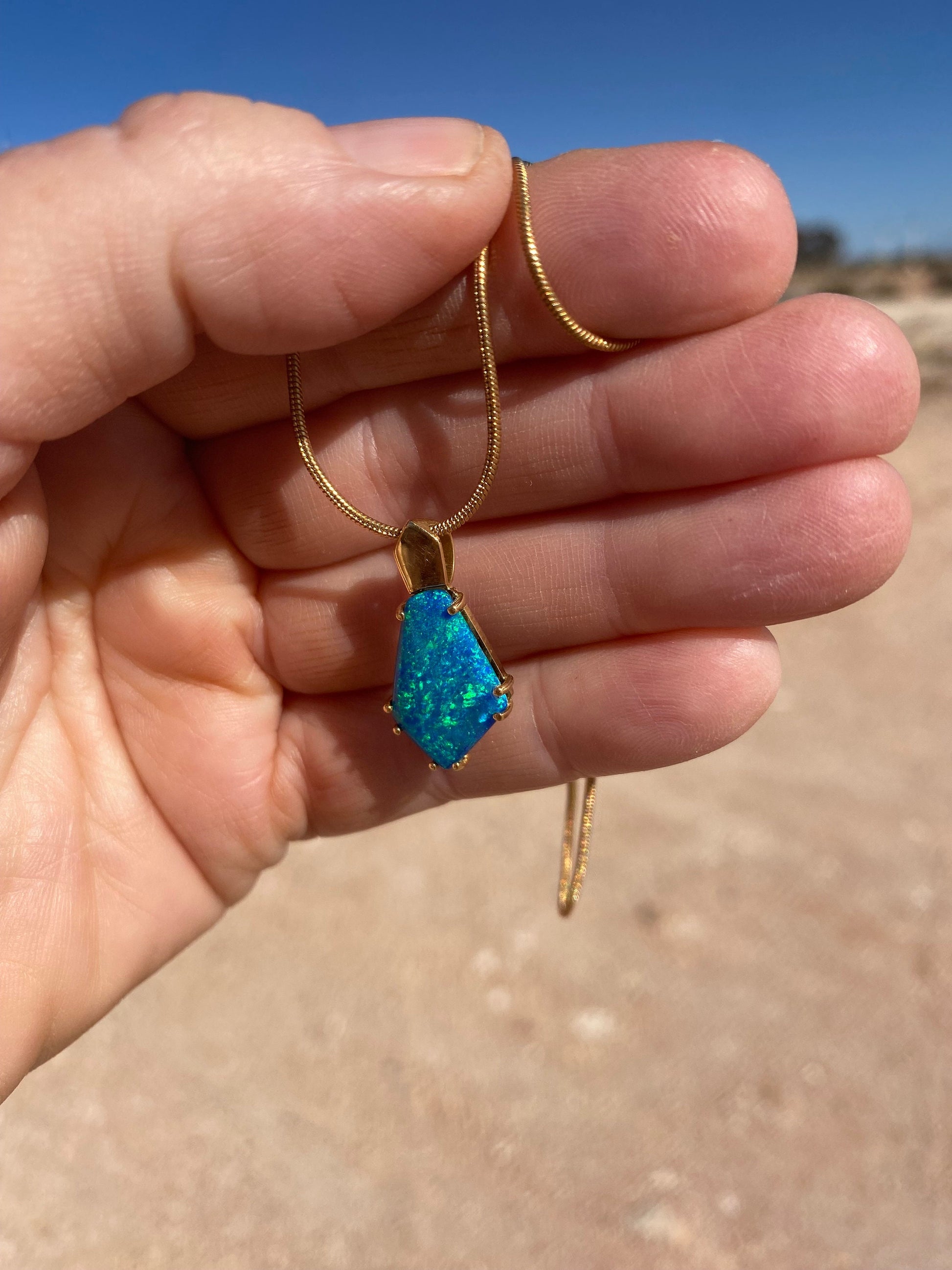 Gold Opal Pendant.