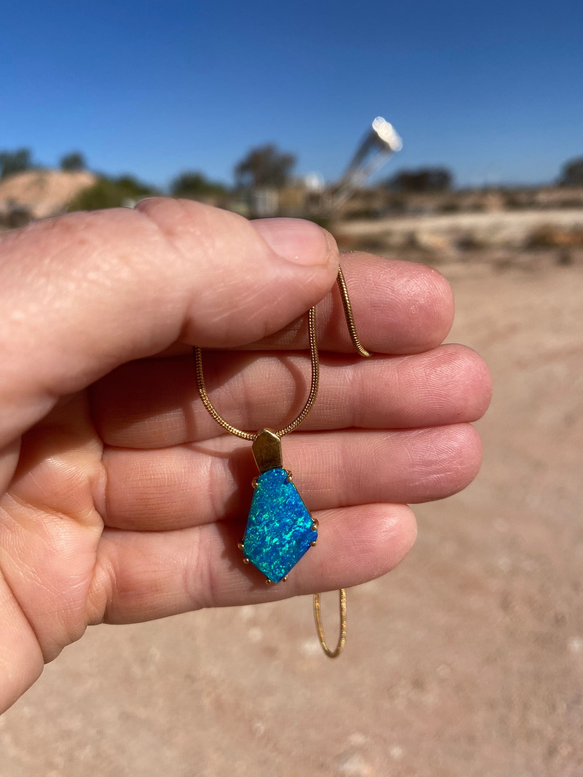 Gold Opal Pendant.